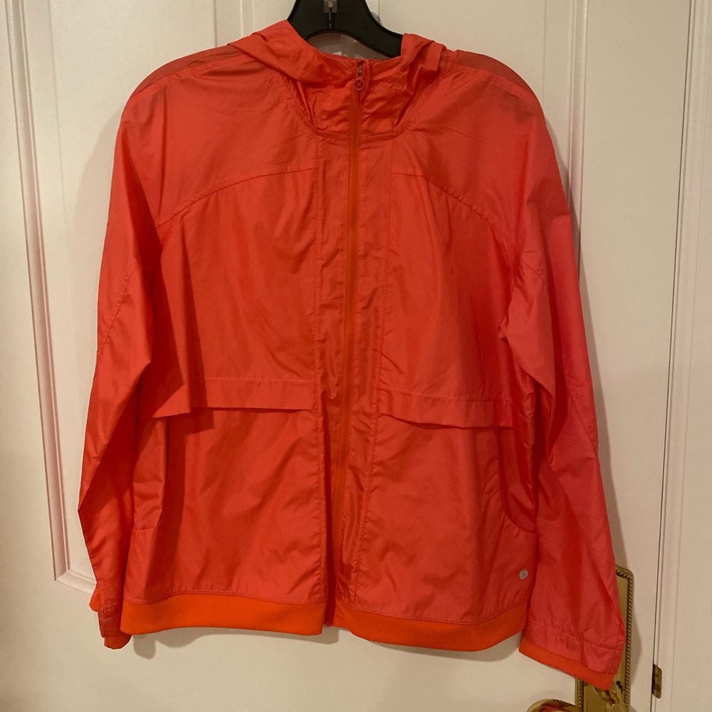 Bright pink red rain jacket
